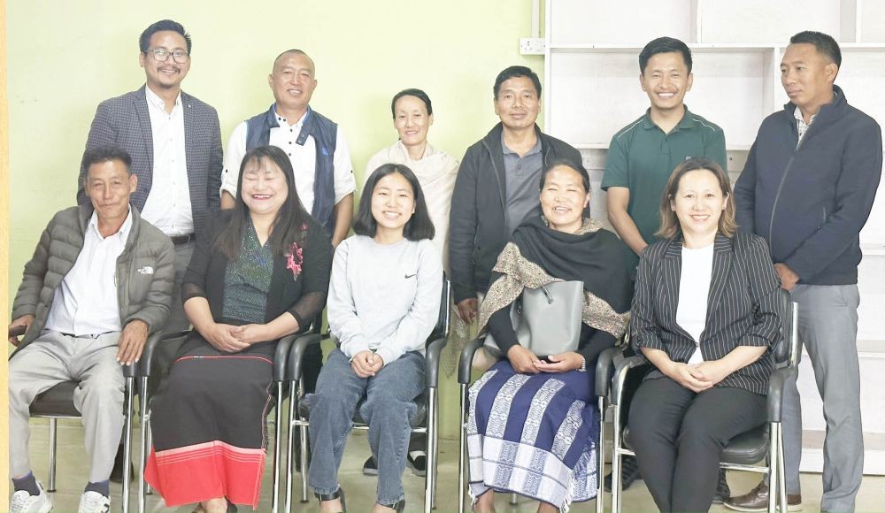 tEA team with Velu Theluo and her parents during the felicitation programme held at Pfutsero on May 29.